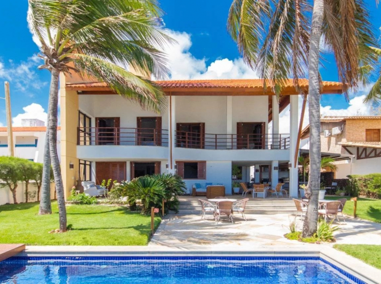 Discover a stunning beachfront villa in Porto Mirim, Brazil. 6 bedrooms, pool, high-end finishes, and ocean views. For sale at €5,800,000.