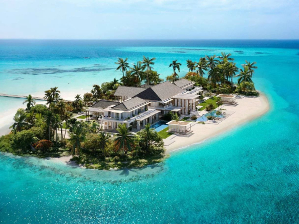 Luxurious villa resort on a private tropical island with white sand and turquoise water Propriétés clovis