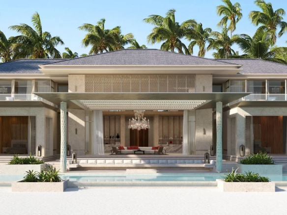 Luxurious beachfront villa with a large pool palm trees and a two story glass railed terrace at daytime Propriétés clovis